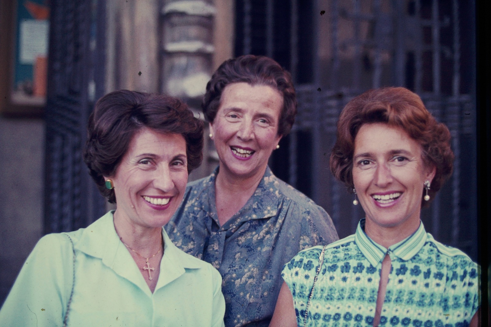 Three women of the Largacha family smiling together in a vintage photograph