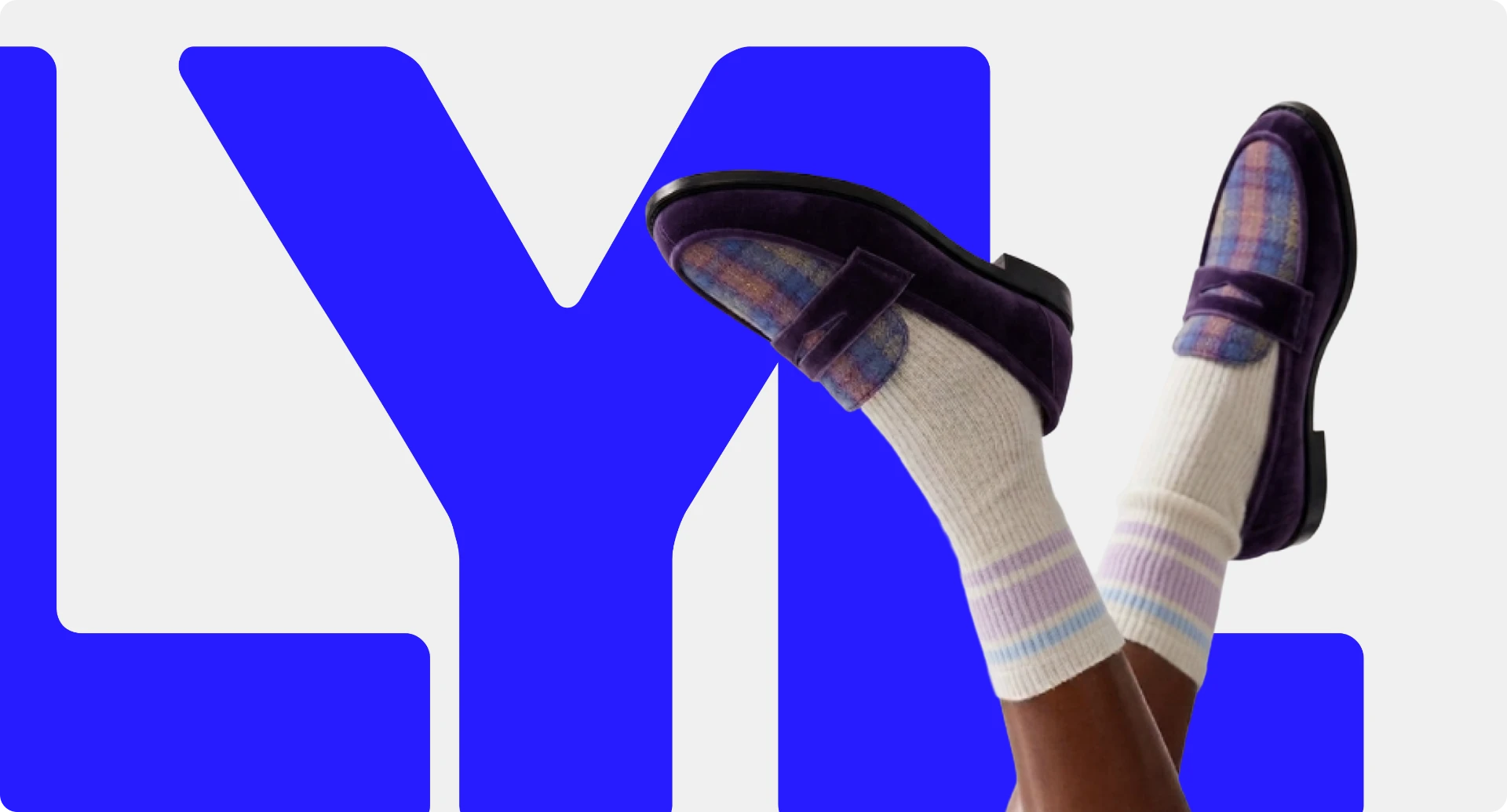 LYL logotype with purple plaid velvet penny loafers and striped socks